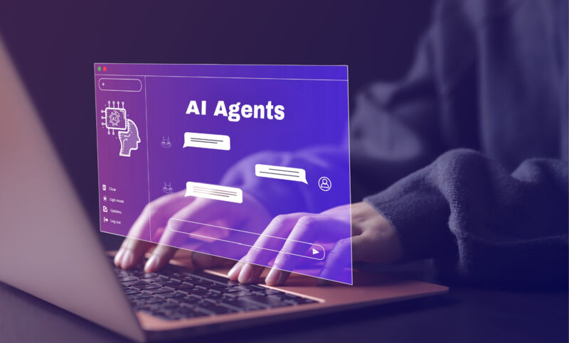 Persoon typt op een laptop waar een hologram verschijnt van een AI-agent